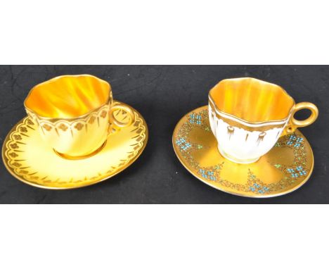 Two early 20th century Coalport &amp; Royal Worcester porcelain coffee cups &amp; saucers. The lot to include a matching yell