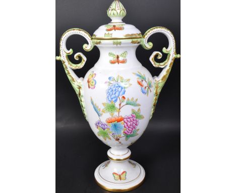 A 20th century Hungarian Herend 'Royal Garden' (old 'Queen Victoria') pattern twin handled urn lidded hand painted vase. The 