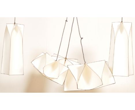 A superb retro vintage 20th Century designer hanging ceiling lights consisting of three graduating origami paper shades with 