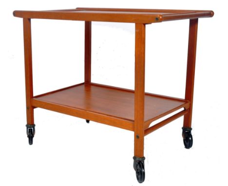 Staples &amp; Co Ltd - A retro vintage 20th Century teak wood two tier drinks / cocktails tea trolley having a single push ra
