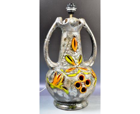 An original retro vintage 1960's West German Fat Lava pottery lamp base light having red molten rock fat lava glazed detailin