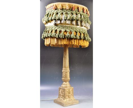 A vintage 20th Century English Hollywood Regency antique style gilt plaster table lamp light having a multi coloured bohemian