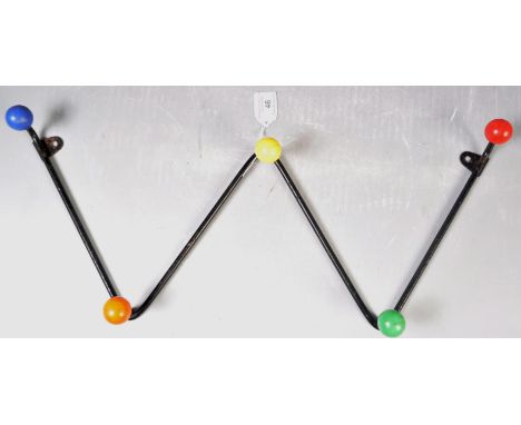 A set of retro vintage mid 20th Century sputnik atomic coat hooks of 'W' shape form finished in black with multi coloured bal