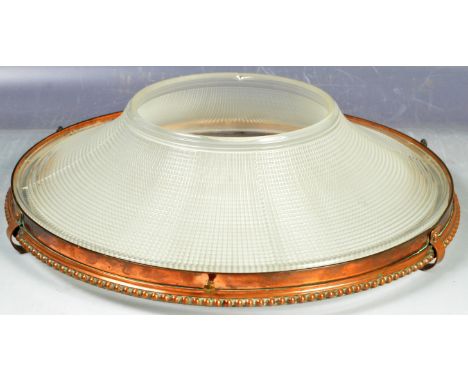 An antique vintage early 20th Century holophane glass ceiling light lamp shade having a conical ribbed glass shade with coppe