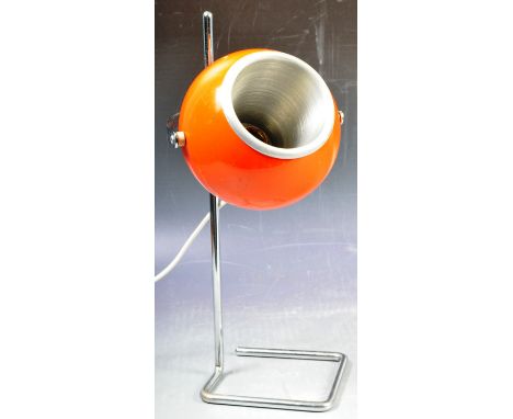 An original retro vintage 1960's Italian designer Eyeball / Eye Ball shape work desk lamp light in an enamel finish raised on