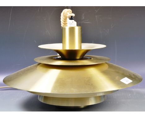 A retro vintage 20th Century Danish ceiling rise and fall lamp light pendant fixture in the manner of Poul Henningsen. The li