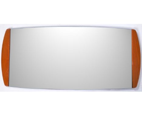 A retro vintage 1960's teak wood wall mirror of frameless oblong shape having teak wood top &amp; bottom and central mirror p