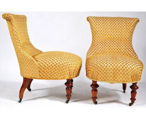 A pair of antique 19th Century Swedish upholstered shell back lounge chairs / easy chairs or bedroom chairs having a shaped b