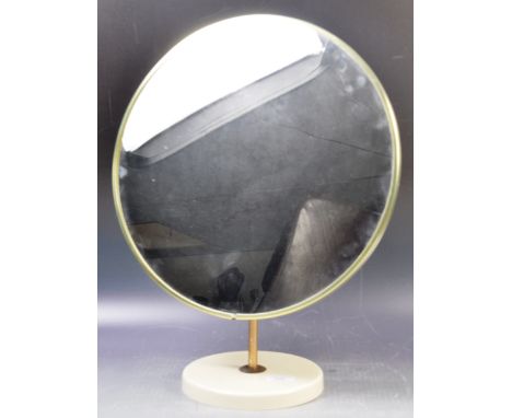 A retro vintage 20th Century dressing table vanity mirror of good size having a circular mirror panel with gold metal edge ra