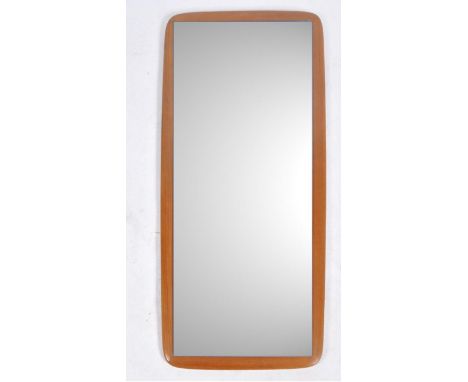 An original retro vintage 1960's Danish Scandinavian teak wood wall mirror / dressing mirror of frameless form having a centr