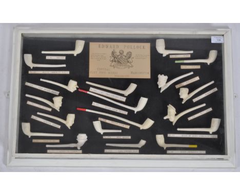 Edward Pollock - A rare and incredible advertising point of sale shop display cased collection of clay pipes consisting of 19