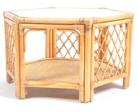 A vintage 20th Century English cane and bamboo glass topped octagonal coffee table / centre / side occasional table having a 