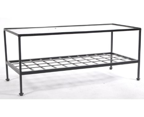 A retro vintage 20th Century black metal framed two tier coffee table / centre occasional book table believed to be McIntosh.