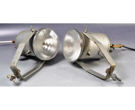 A pair of retro vintage 20th Century studio / external wall mountable lamp lights each within barrel grey painted cases with 