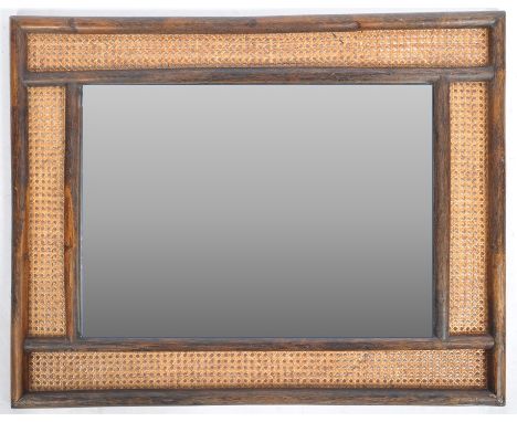 An original retro vintage mid 20th Century Boho bamboo / cane &amp; wicker wall mirror having a central mirror panel surround