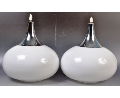 A matching pair of retro vintage 20th Century believed Holmegaard white glass studio art glass ceiling light shades. Both wit