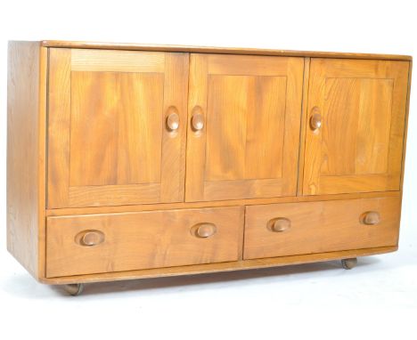 Lucian Ercolan- Ercol - Windsor model 468 - A retro vintage 1960's elm wood sideboard credenza having a twin door shelved cup