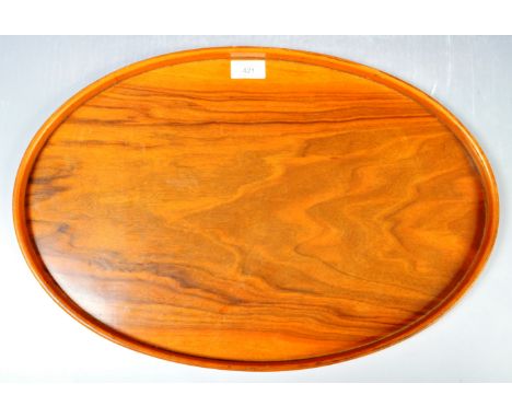 A vintage early 20th Century Art Deco English walnut drinks / cocktails serving tray of simple oval form having a raised gall