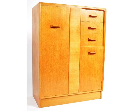 E Gomme - G Plan - Brandon Range - An original mid 20th Century 1950's light oak / golden oak bachelors robe / tall boy compr