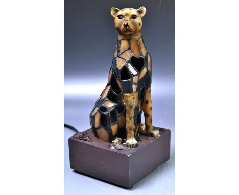 A vintage 20th Century Tiffany style table lamp light in the form of cheetah / big cat having a detailed plastic head with pa