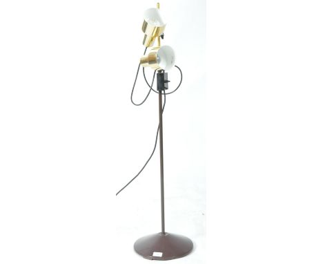 A retro vintage 20th Century 1970's free standing upright adjustable twin spotlight floor lamp light having two rise and fall