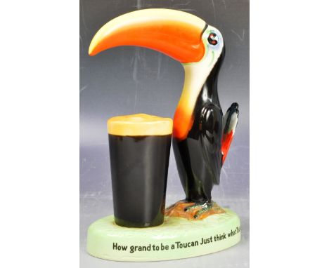 Guinness - A retro vintage 20th Century ceramic porcelain figurine depicting the Guinness Toucan&nbsp; standing on base with 