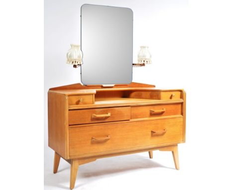 E. Gomme- G Plan - Brandon Range - A retro vintage 20th Century light oak dressing table chest having a central mirror panel 