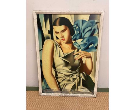 An Art Deco style print of a woman in evening dress, 70 x 47cm, framed.