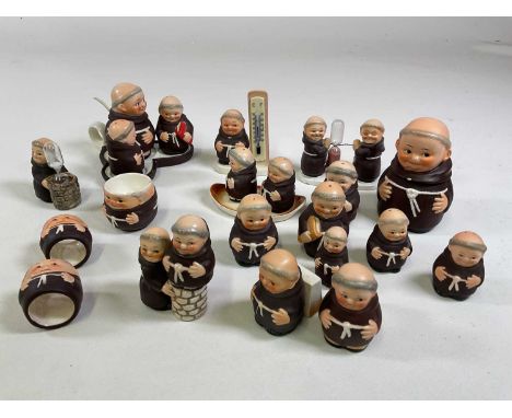 A collection of Goebel monks including a cruets, a timer, napkin rings, bottle stop, thermometer and other items