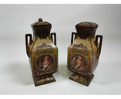A pair of Art Nouveau confectioners' tins styled as urns stamped to inside lid 'John Buchanan &amp; Bros, Glasgow, Makers of 