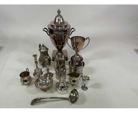 A quantity of silver plated items to include a tea urn,a trophy, a soup ladle, candlesticks and others