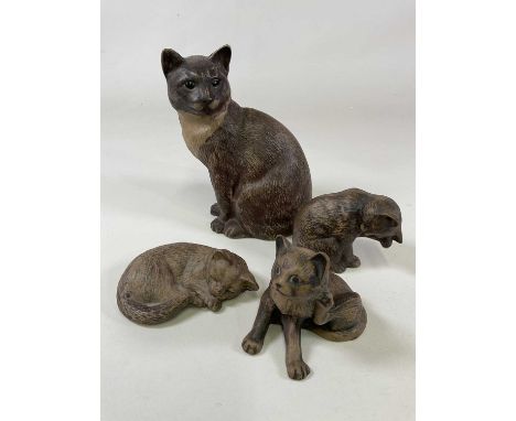 POOLE POTTERY; four stoneware cats including a tall seated cat, height 27cm, and three kittens