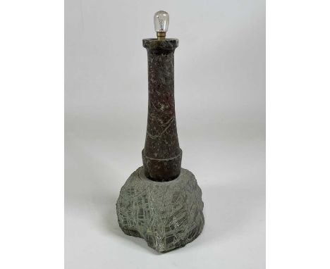 A Cornish serpentine lamp base modelled as a lighthouse set upon a granite base, height 41cm.