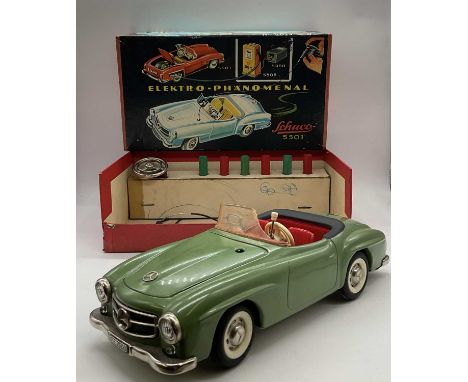 SCHUCO; an Elektro Phanomenal 5503 Mercedes Benz green car with red interior, boxed and with accessories to include the cable