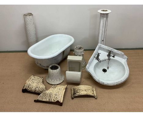 Various garden and architectural items to include a child's roll top enamel bath, a porcelain corner sink with cast iron reli