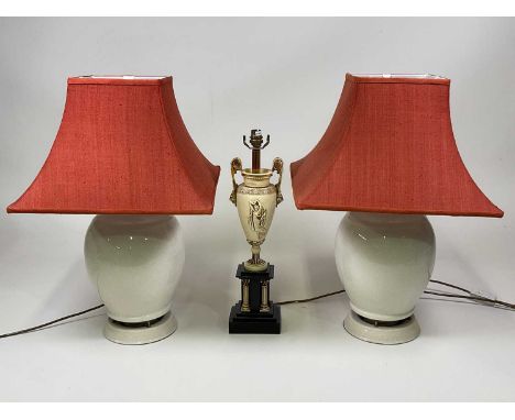 A pair of crackle glaze table lamps with internal speakers, height 32cm, also with a table lamp in the neo classical style. (