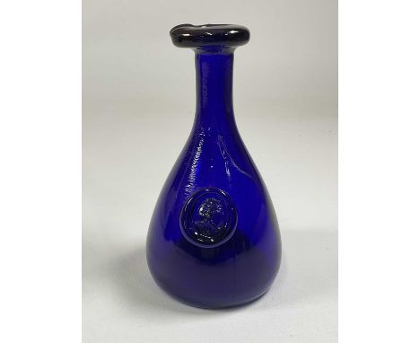 OLE WINTHER FOR HOLMEGAARD; a mid 20th century Danish art glass Viking wine carafe with an applied seal with relief mould of 