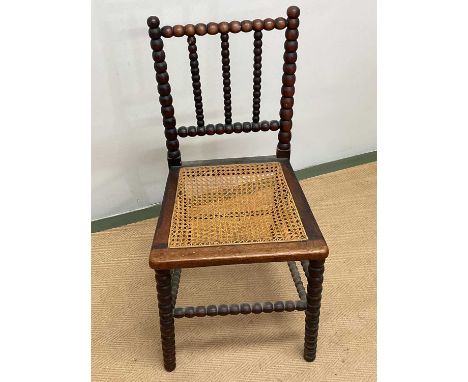 A 19th century mahogany bobbin side chair, seat af. Seat height 43cm Height of back 81cm 