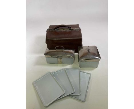 A Drew &amp; Sons 'En Route' picnic set, constructed of ceramic, glass, enamel, wicker and comprising leather trays, beakers,