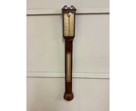 WATKINS & HILL OF LONDON; an early 19th century mahogany stick barometer with silvered dials, height 100cm 