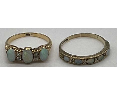 An Edwardian yellow metal opal and diamond ring, size J 1/2, and a 9ct yellow gold opal and diamond half eternity ring, size 