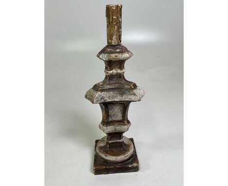 A 19th century Continental (possibly Italian) carved wood gesso painted candlestick, height 39cm.