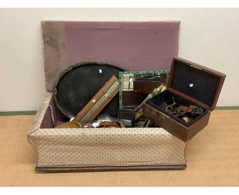 A late 19th century upholstered ottoman, together with an eclectic collection of items to include boxes, trays, mirror, lamp,