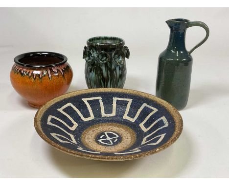 European studio pottery, comprising a Danish stoneware bowl with dark blue glaze, a Hungarian vase with mottled drip glaze, a