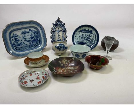 A group of Oriental wares including a Chinese blue and white rounded rectangular platter with white metal applied ring, a lat