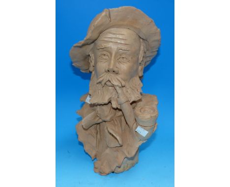 A terracotta ceramic sculpture of a Tyrolean man with pipe, by Paoletti