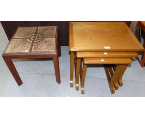 A modern nest of 3 teak occasional tables; a small tile top occasional table