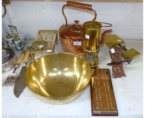 A 19th century copper kettle; a brass trivet; a miner's lamp; other items