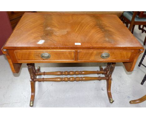 A reproduction mahogany sofa table