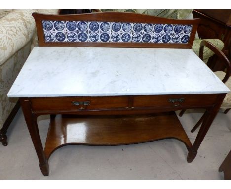 An Edwardian Arts & Crafts marble top washstand with tile back, 2 drawers and undertier